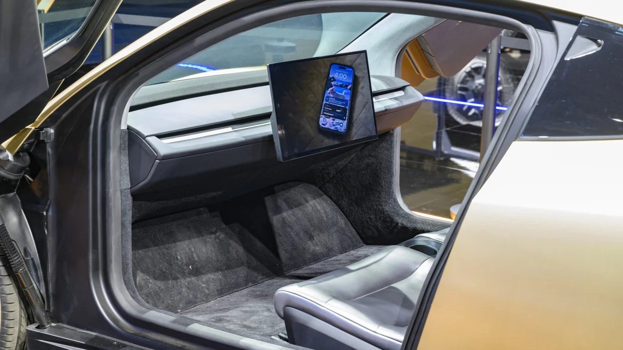 Tesla Cybercab production model no steering wheel no pedals butterfly doors 2026