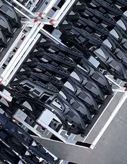 Cybercab rear quarter panel inner structures outside of the Giga Texas factory that are ultrasonically welded (& some structural adhesives) to the outer RIM Gold exterior panels
